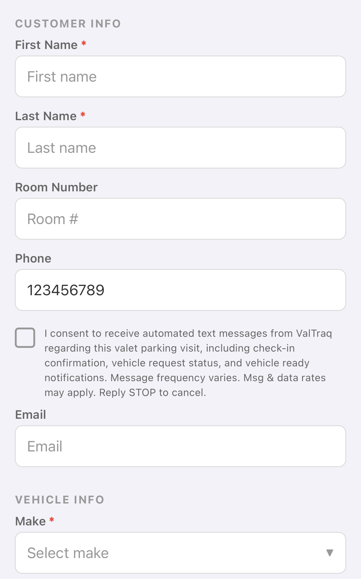 ValTraq mobile app check-in screen showing unchecked SMS consent checkbox below the phone number field